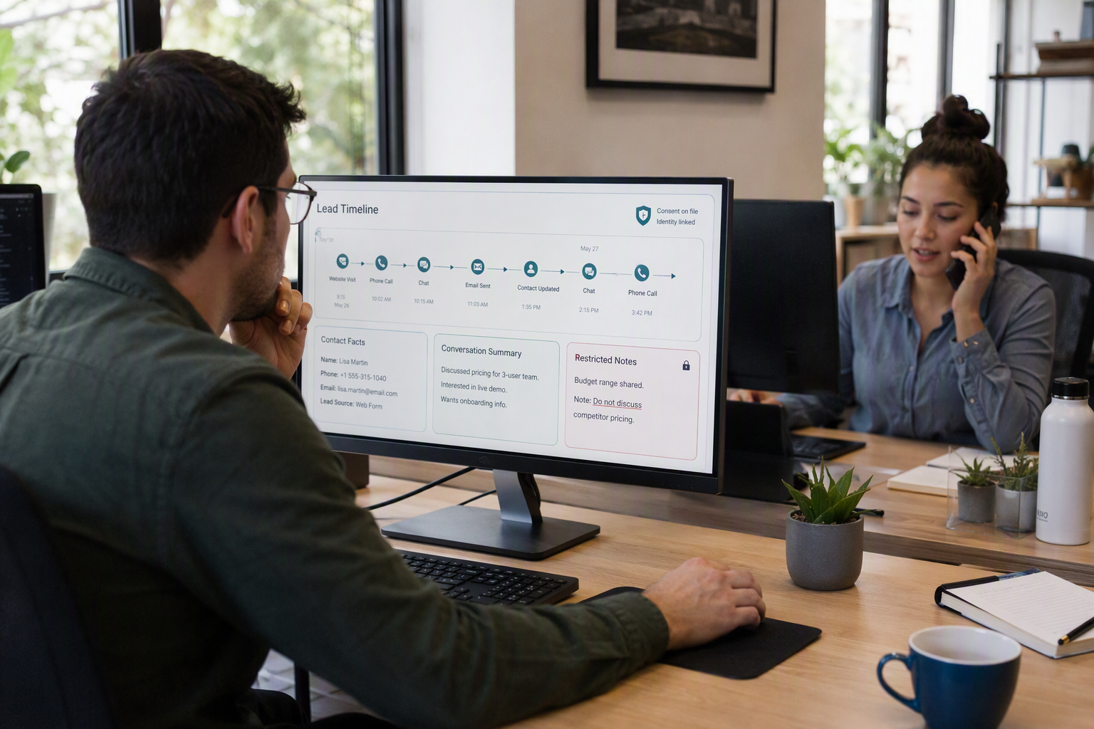 A customer service operations scene inside a bright small-business office, with one adviser reviewing a unified lead